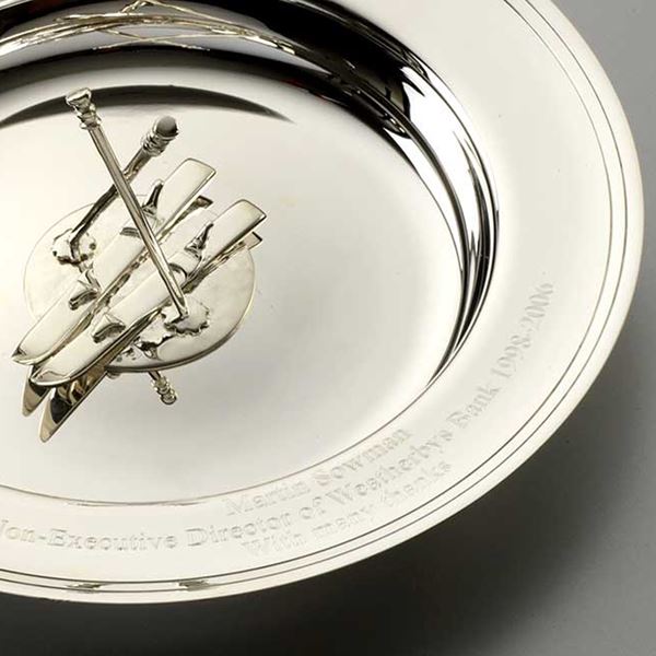 silver dish with skis