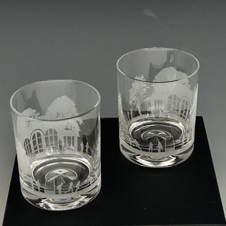A Pair of Hockey Scene Etched Glasses
