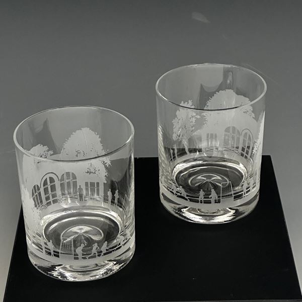 A Pair of Hockey Scene Etched Glasses